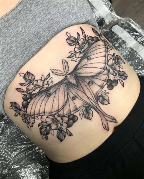 Top 10 underboob moth tattoo ideas and inspiration